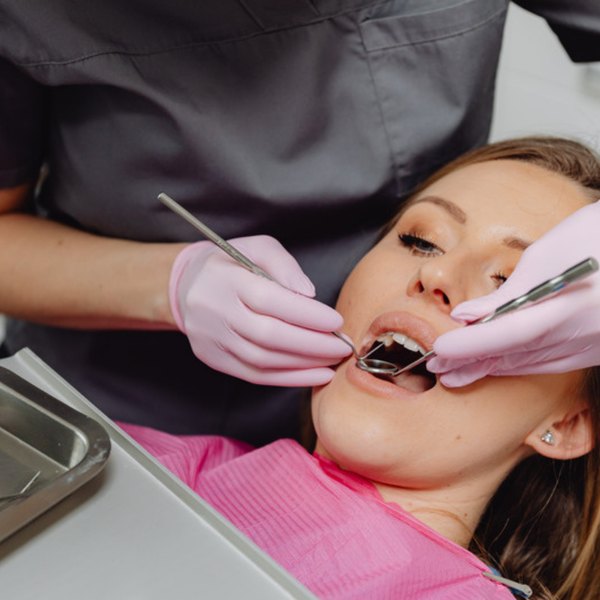 Dentist examining a patient's teeth