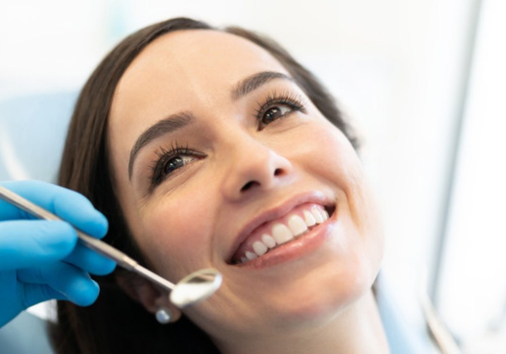 A smiling woman at a dental check-up